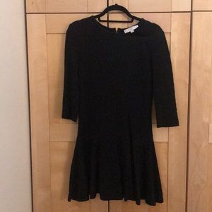 Black peplum patterned dress from Loft size Sm